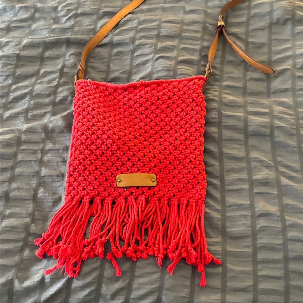 Adorable Lucky Brand red crochet purse with fringe.